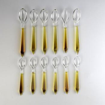 Set of yellow glass spoons Set of yellow glass spoons